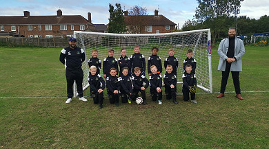 Junior football teams score a new kit!